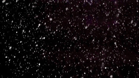Snow-flakes-overlay-Winter,-slowly-falling-snow-effect-Dust-particles-seamless-loop-on-black-background.